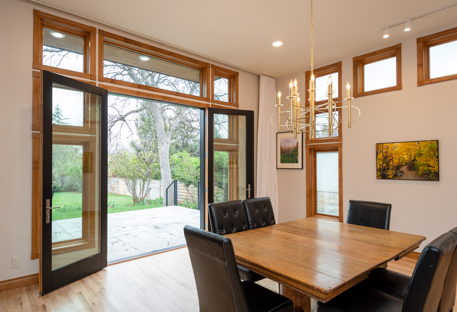 3360-25th-st-dining-room-shelves-doors - image 3360-25th-st-dining-room-doors-open on https://www.flatironsconstruct.com