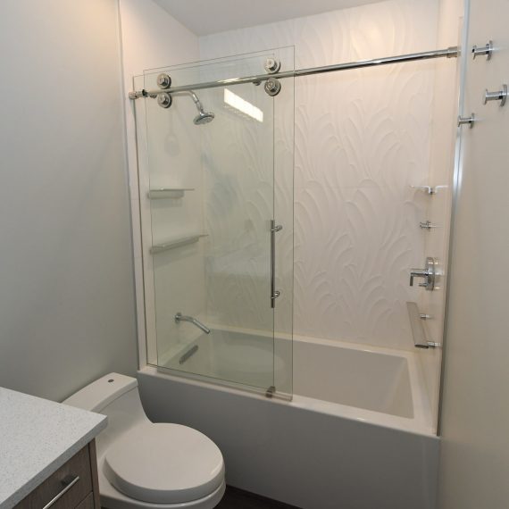 Portfolio - image 624-pearl-304-guest-shower-bath-glass-enclosure-barn-doors-1-570x570 on https://www.flatironsconstruct.com